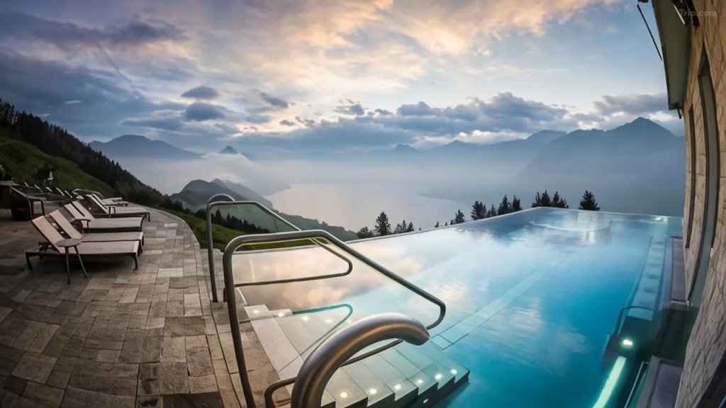 Hotel Villa Honegg infinity pool with Swiss Alps mountain view