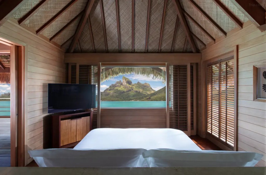 Four Seasons Bora Bora overwater bungalows with lagoon and mountain view